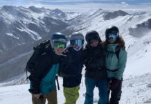 Top Women’s Backcountry & Ski Touring Packs four women with colorado peaks behind them in winter
