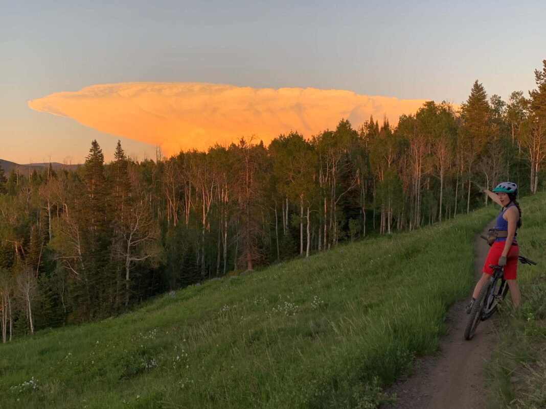 woman riding juliana roubion in aspen colorado during cloud event